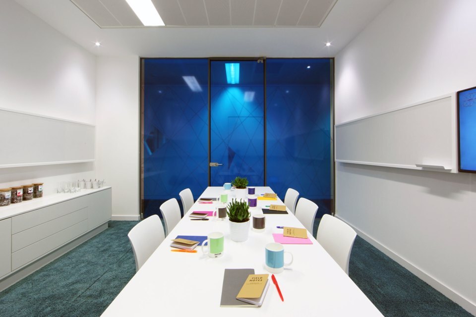 A 6 person meeting room with a blue glass window at Citylabs 1.0