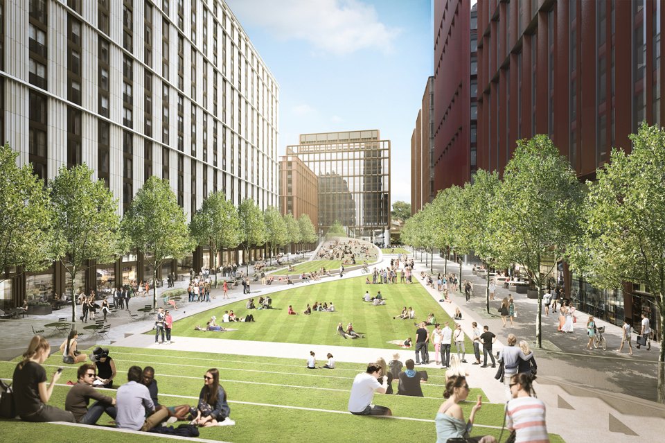 A shot of Symphony Park showing the large, open spaces where people are congregating and socialising.