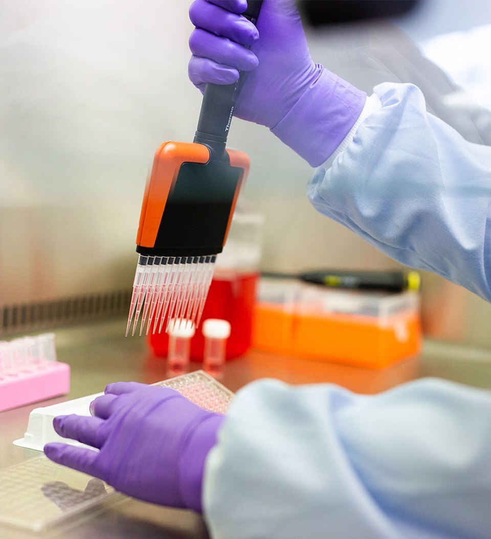 A closeup of someone working in a lab