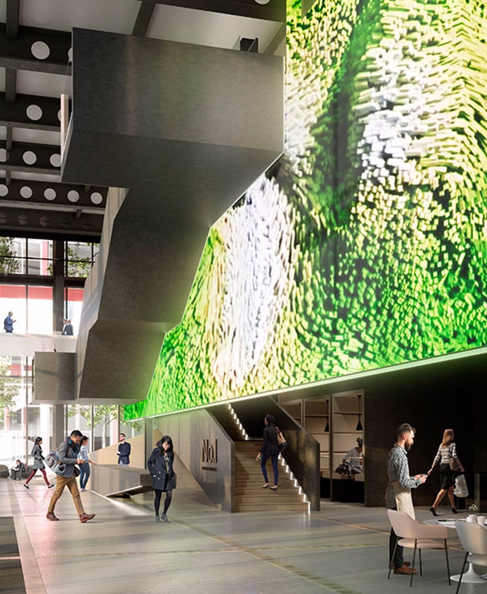 People walking through the reception space at No.1 Circle Square