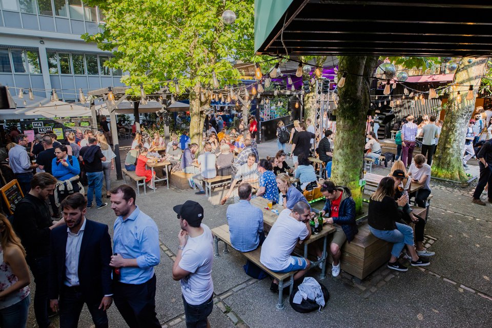 Customers sat in the garden of Manchester Hatch food destination