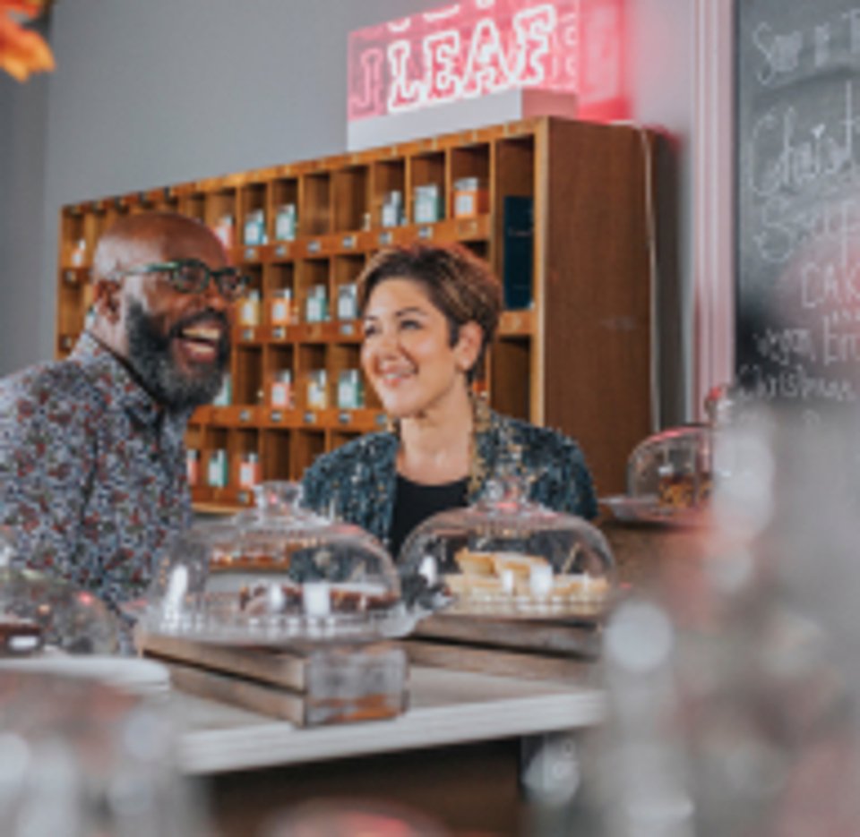 Two people in a cafe