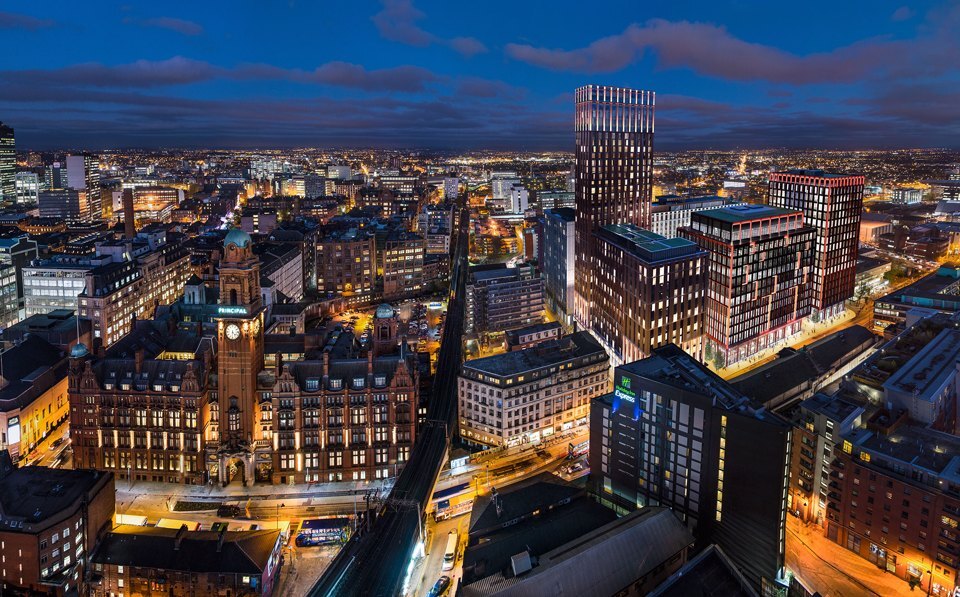 An aerial view of Manchester Circle Square at dusk