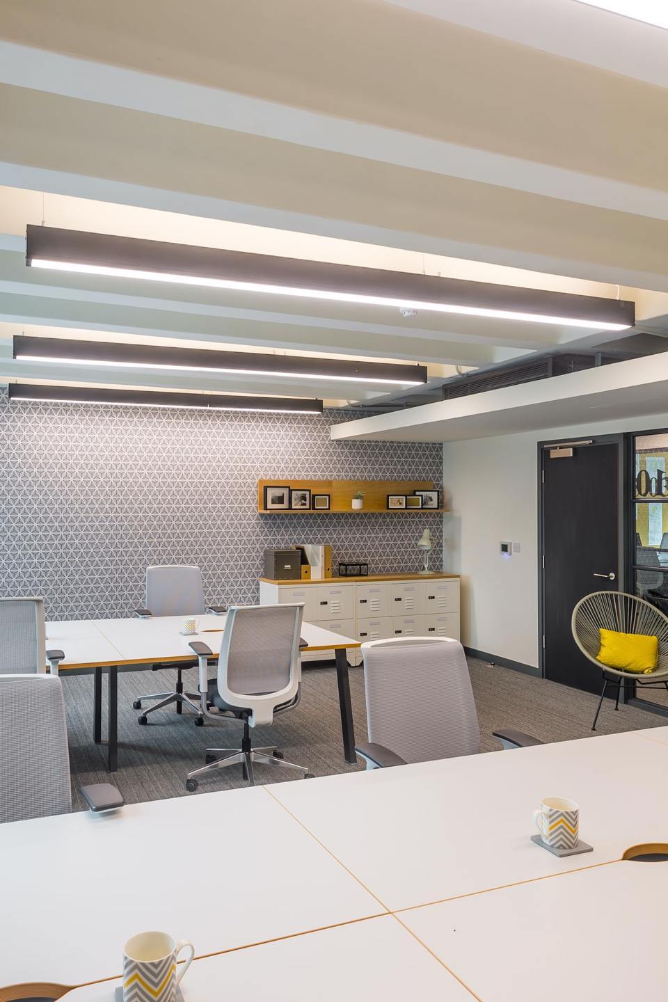 Bruntwood office space containing large white desks and white office chairs at 111 piccadilly